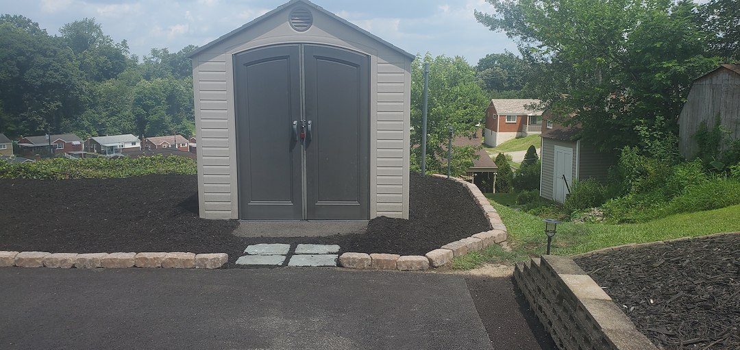 Backyard renovation creating a low maintenance space in McKeesport, Pa.