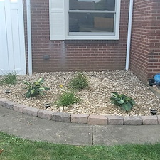 Decorative stone installation and new stone border with plant removal and replanting in Munhall, Pa