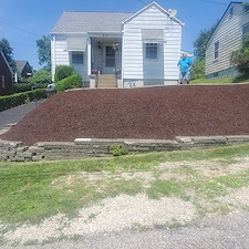 Hillside landscaping transformation converting it into a low maintenance space in West Mifflin, Pa