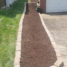 Hillside-transformation-into-a-low-maintenance-clean-looking-space-in-Verona-Pa 0