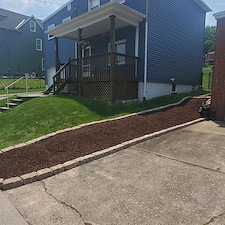 Hillside transformation into a low maintenance clean looking space in Verona, Pa.