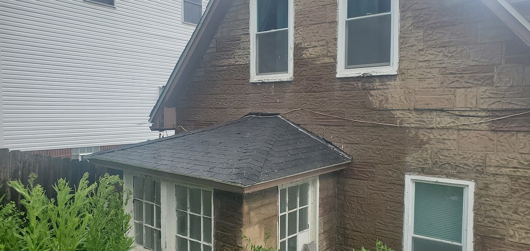 Roof cleaning with moss removal and concrete cleaning in Munhall, Pa