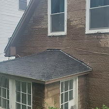 Roof cleaning with moss removal and concrete cleaning in Munhall, Pa
